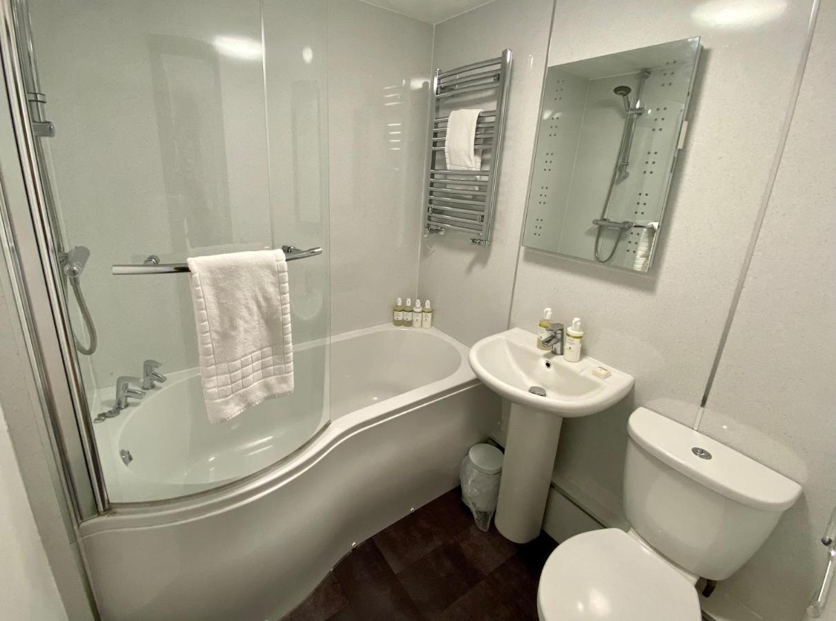 The Lion At West Pennard Hotel Exterior photo Bathroom in a UK hotel