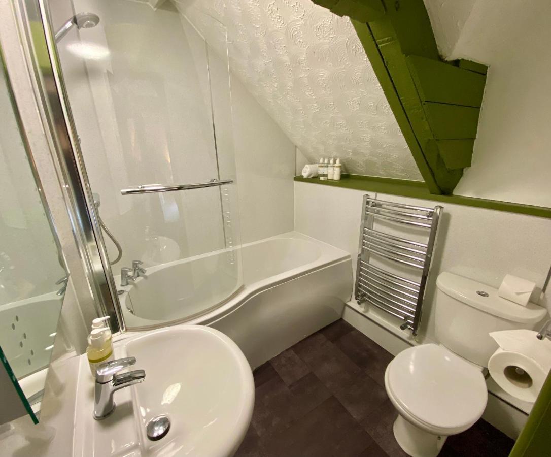 The Lion At West Pennard Hotel Exterior photo A bathroom in the UK