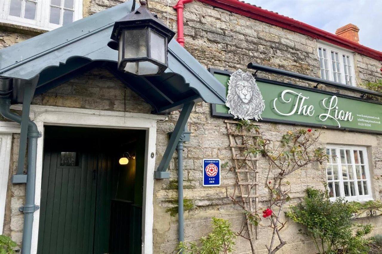 The Lion At West Pennard Hotel Exterior photo The Lion Inn, Settle