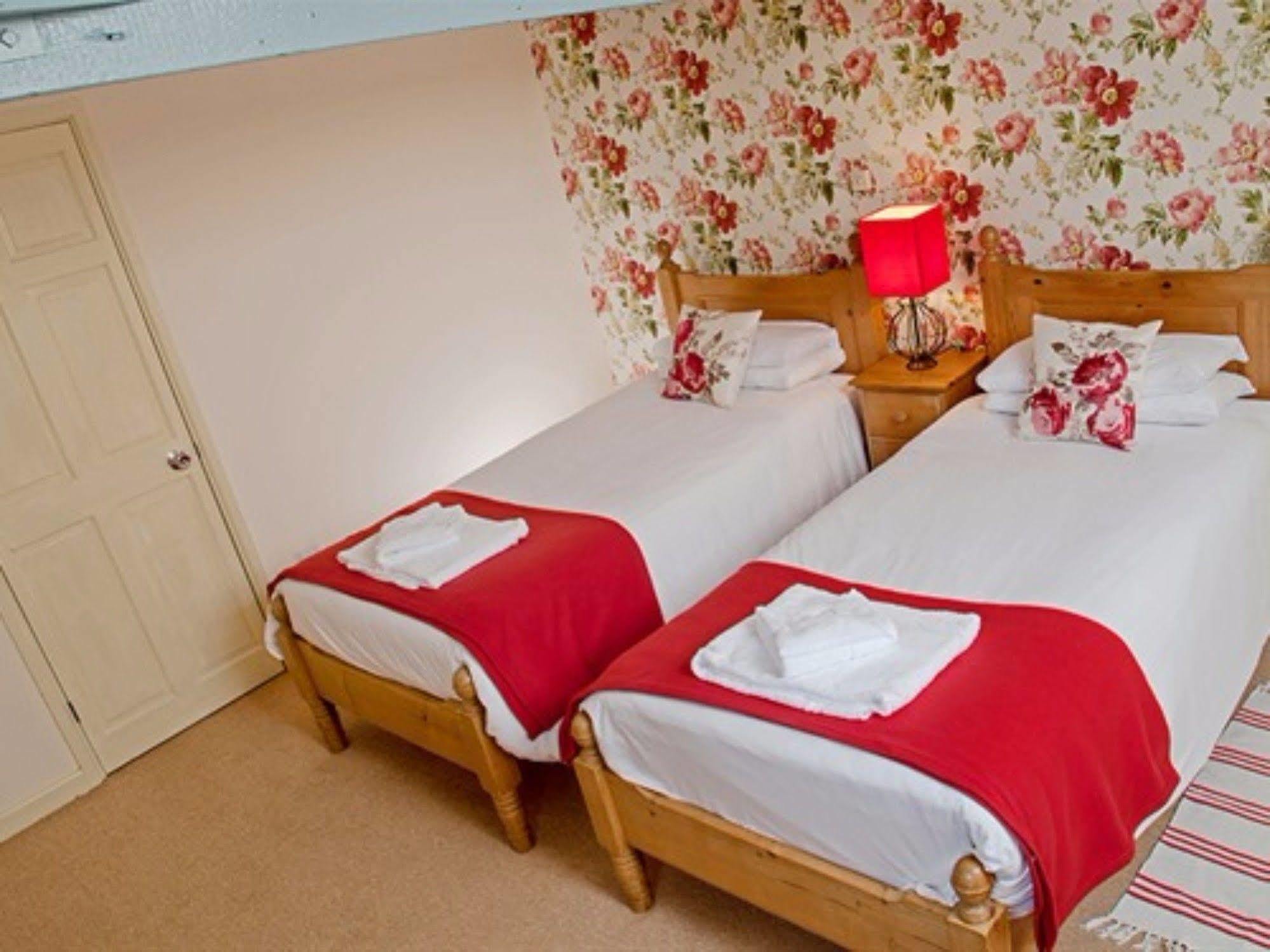 The Lion At West Pennard Hotel Exterior photo A typical bedroom at the hotel